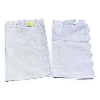 Two GC embroidered pillowcases