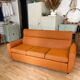 Vintage orange convertible sofa