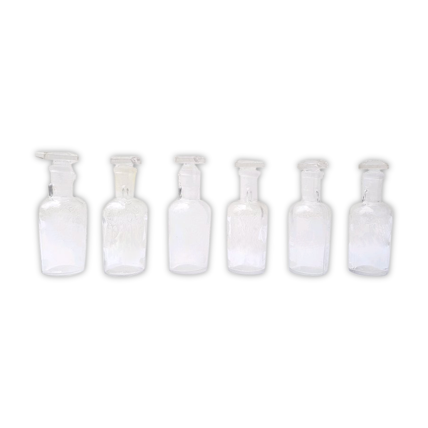 6 glass vials with glass plugs