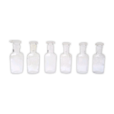 6 glass vials with glass plugs