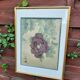 Chinese print purple flower under golden frame