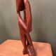 Wooden sculpture inspired by Rodin's "The Thinker"