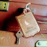 Old suitcase in vulcanized fibre