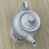 Teapot in white porcelain