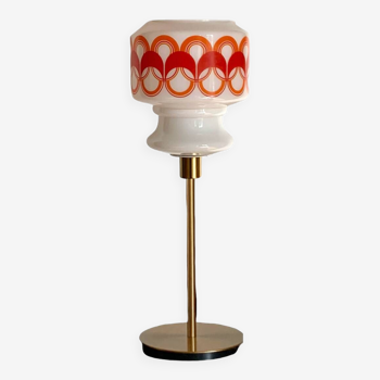 Table lamp with a vintage globe orange patterns 70s