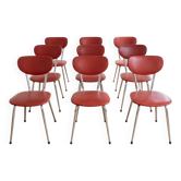 Set of 9 vintage retro chairs in red faux leather.