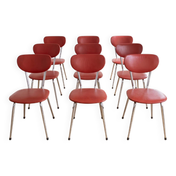 Set of 9 vintage retro chairs in red faux leather.