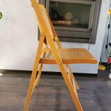 Vintage wooden folding chair with 1970 rattan seat and back