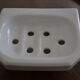 White ceramic wall soap holder