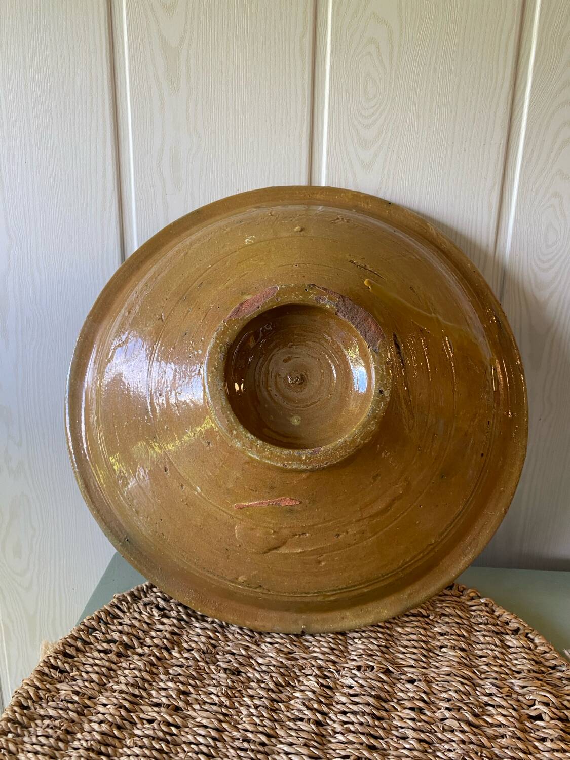 Old glazed terracotta dish