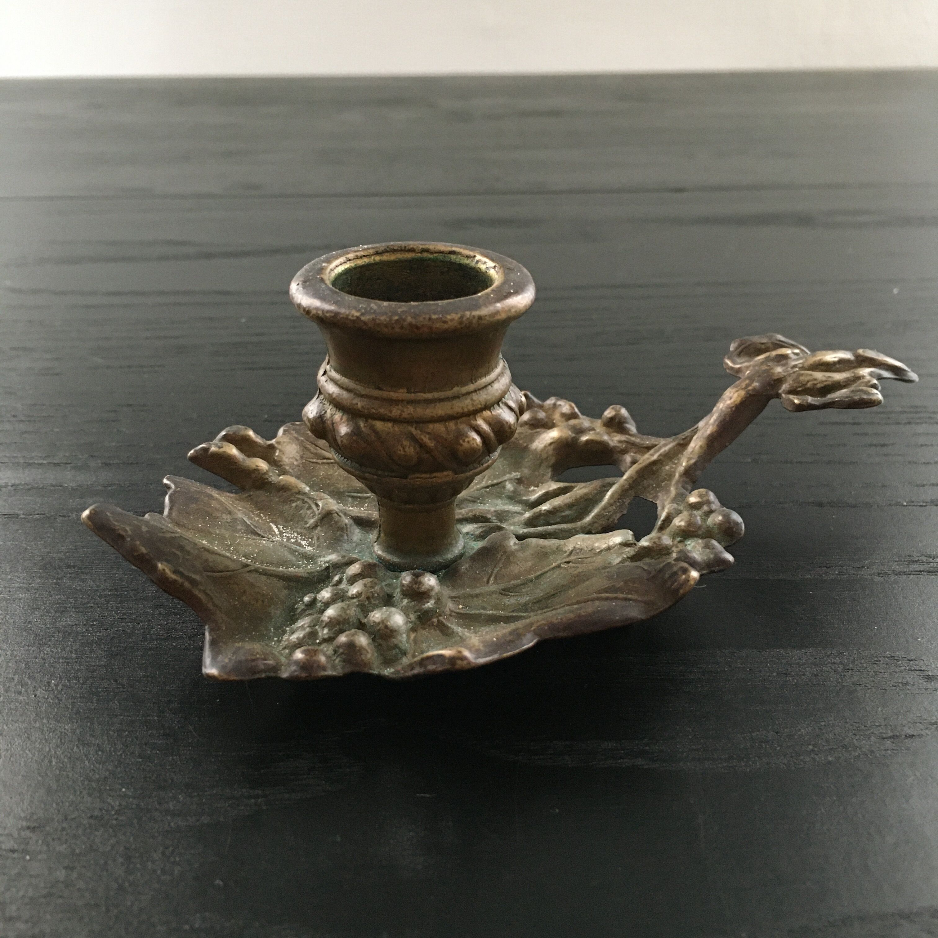 Bronze cellar rave candle holder