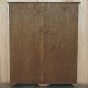 Pair of Sheraton Revival bookcases in satinwood, walnut, and yew.