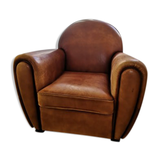 Tawny vintage leather club chair
