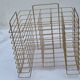 Vintage "wire" magazine rack in gold metal