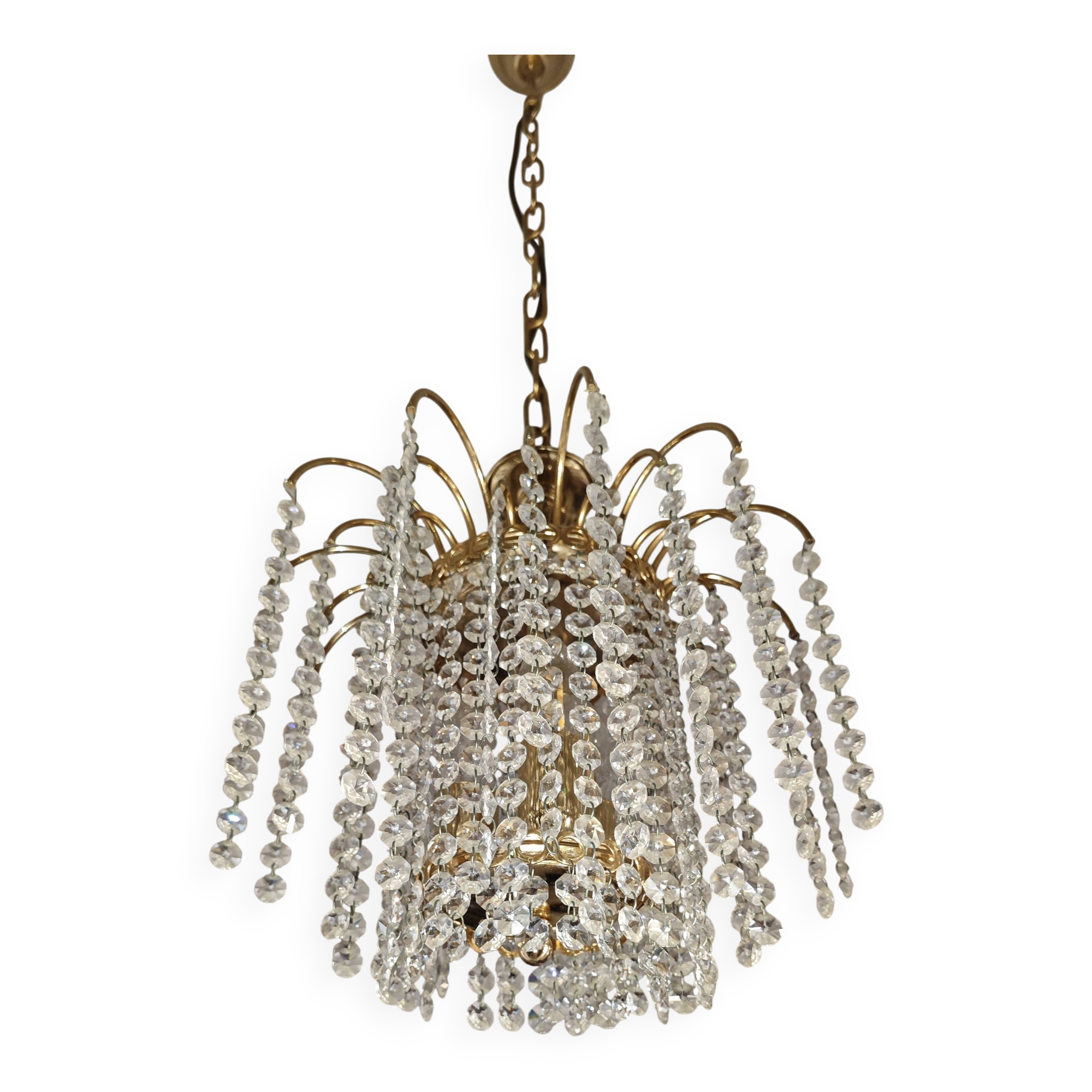 Brass cascading chandelier with crystals