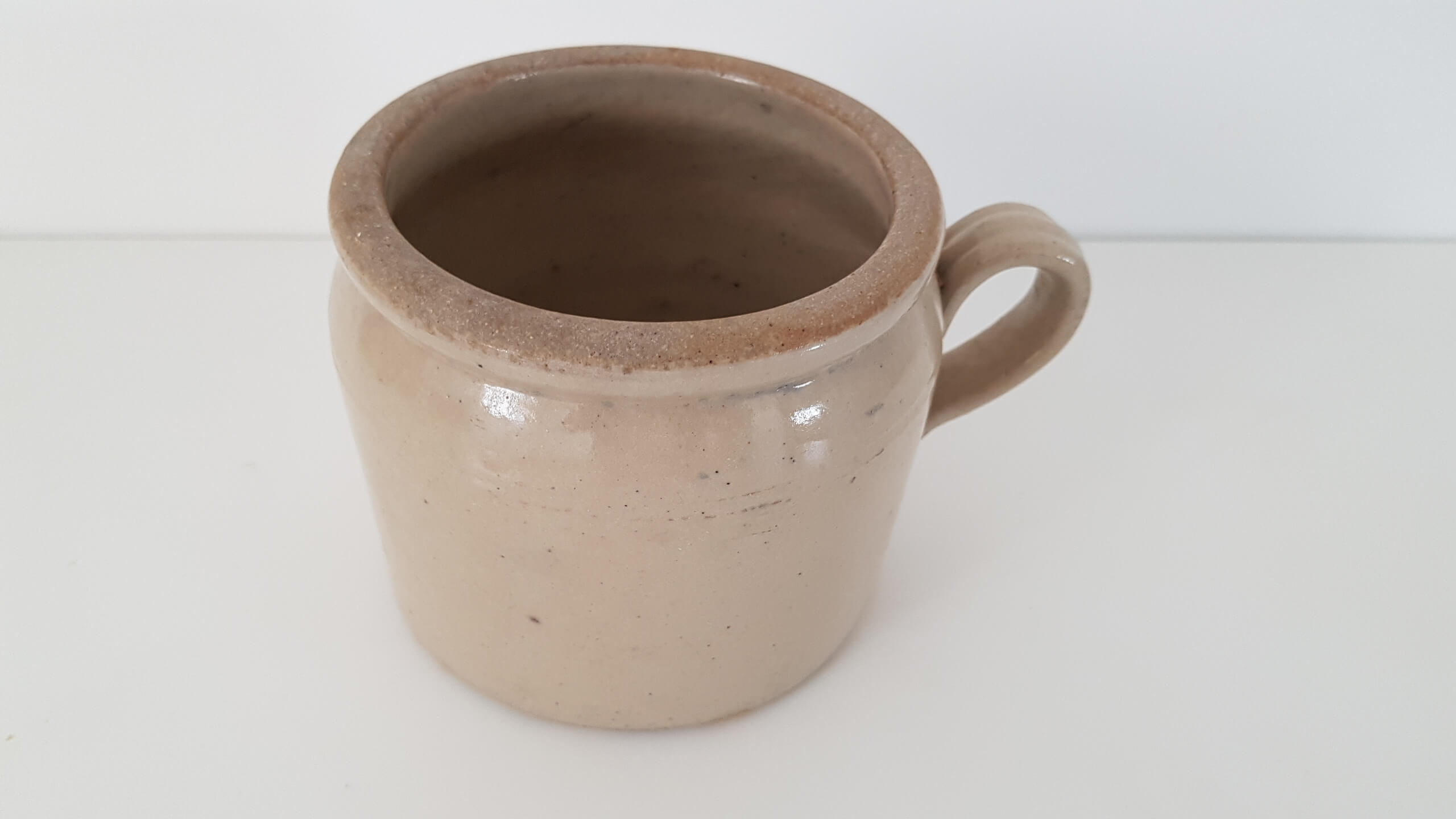 Old terracotta butterpot