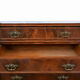 Antique Napoleon III commode in flame mahogany, with a white marble top.