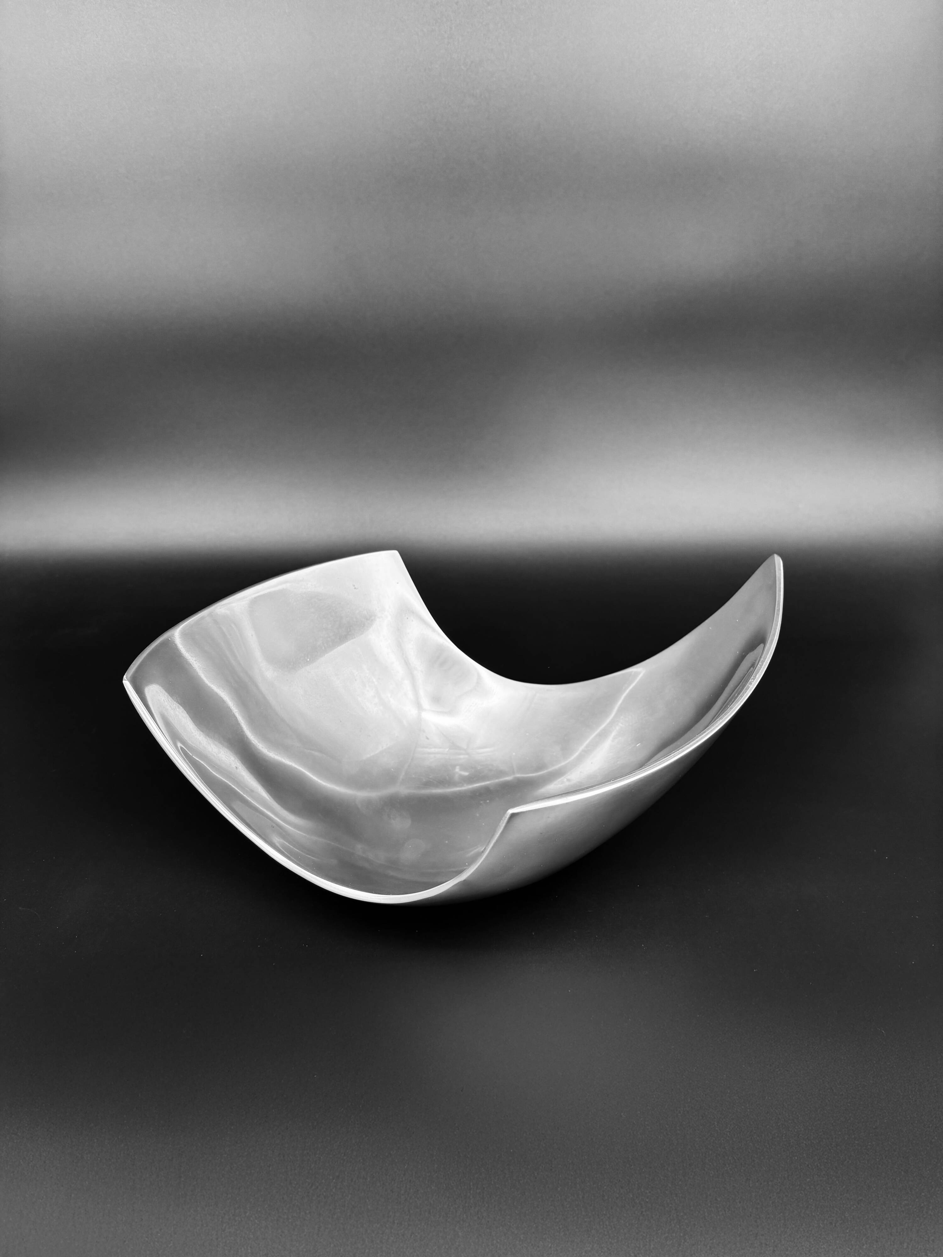 Sculptural polished aluminium bowl, in the style of Michael Lax, 1970s.