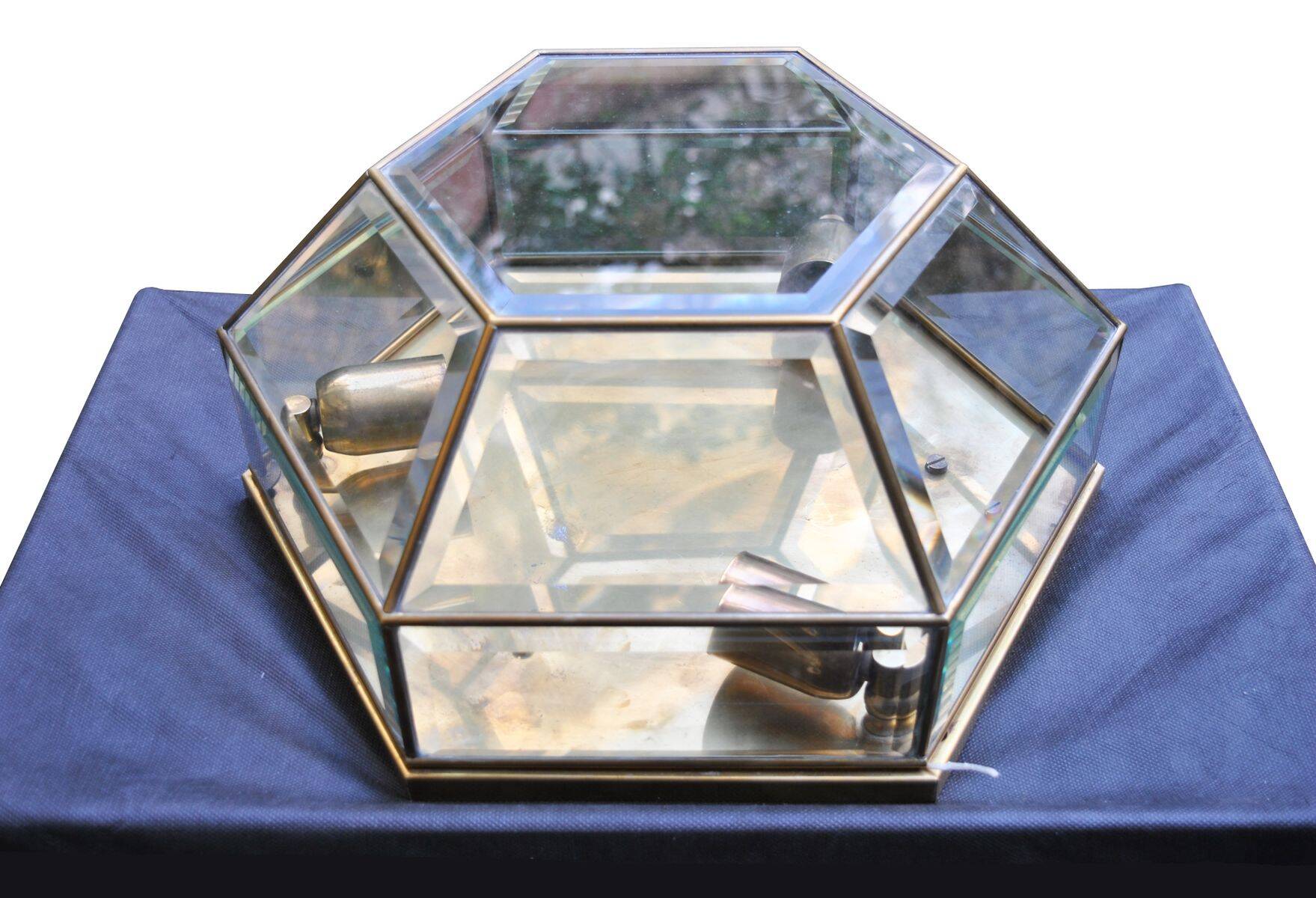 Brass and sculpted transparent crystal wall light, 1950s.