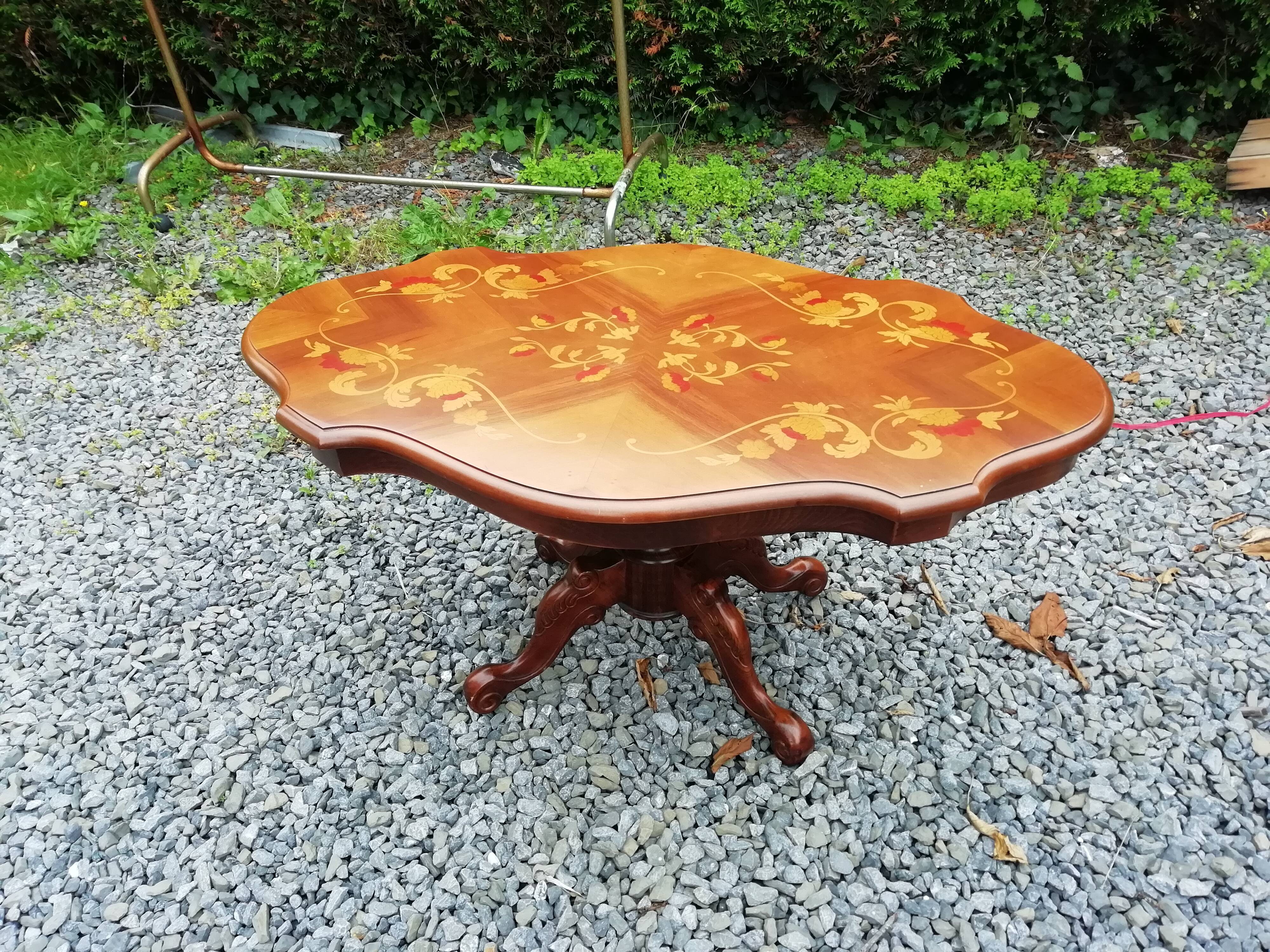 Coffee table with marquetry top