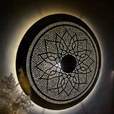 Large oriental wall lamp in hammered gold-plated perforated brass, 100 cm.