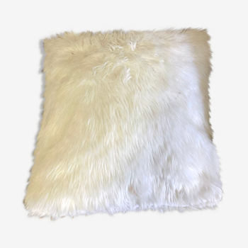 White faux fur cushion
