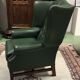In the 1970s green leather Chesterfield armchair