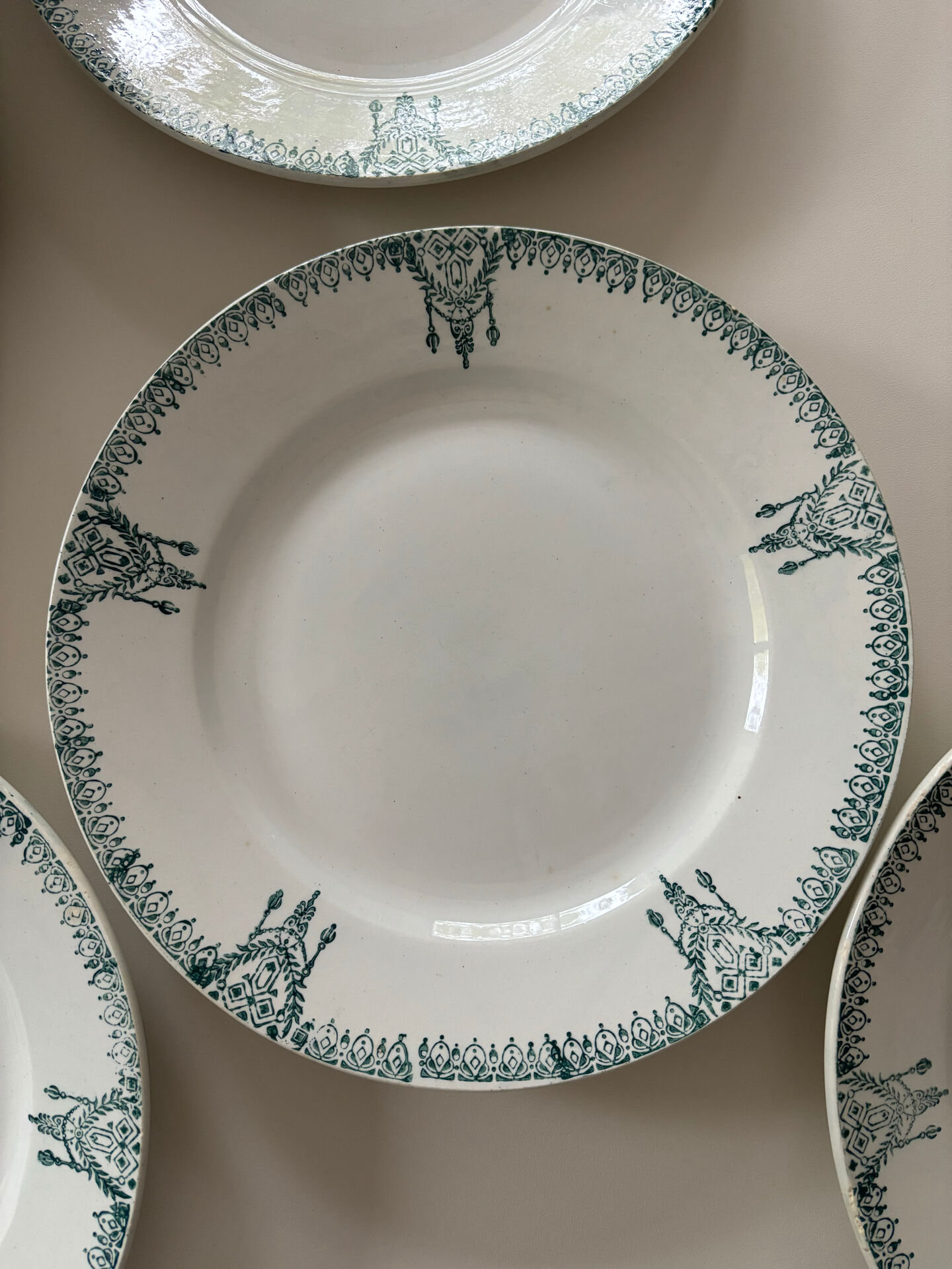 Flat plates in antique St Amand earthenware