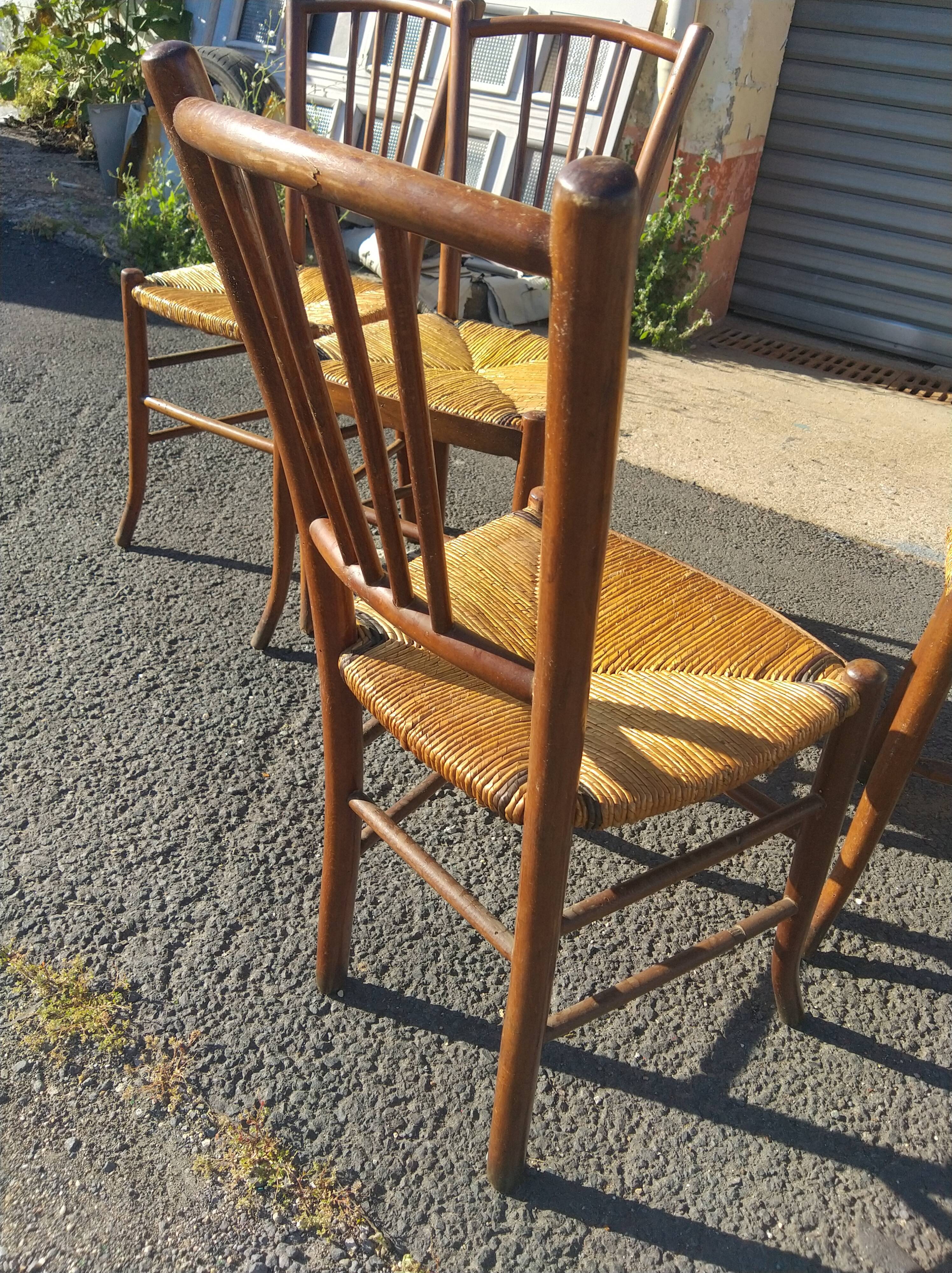 Set of 4 straw-seated bistro chairs