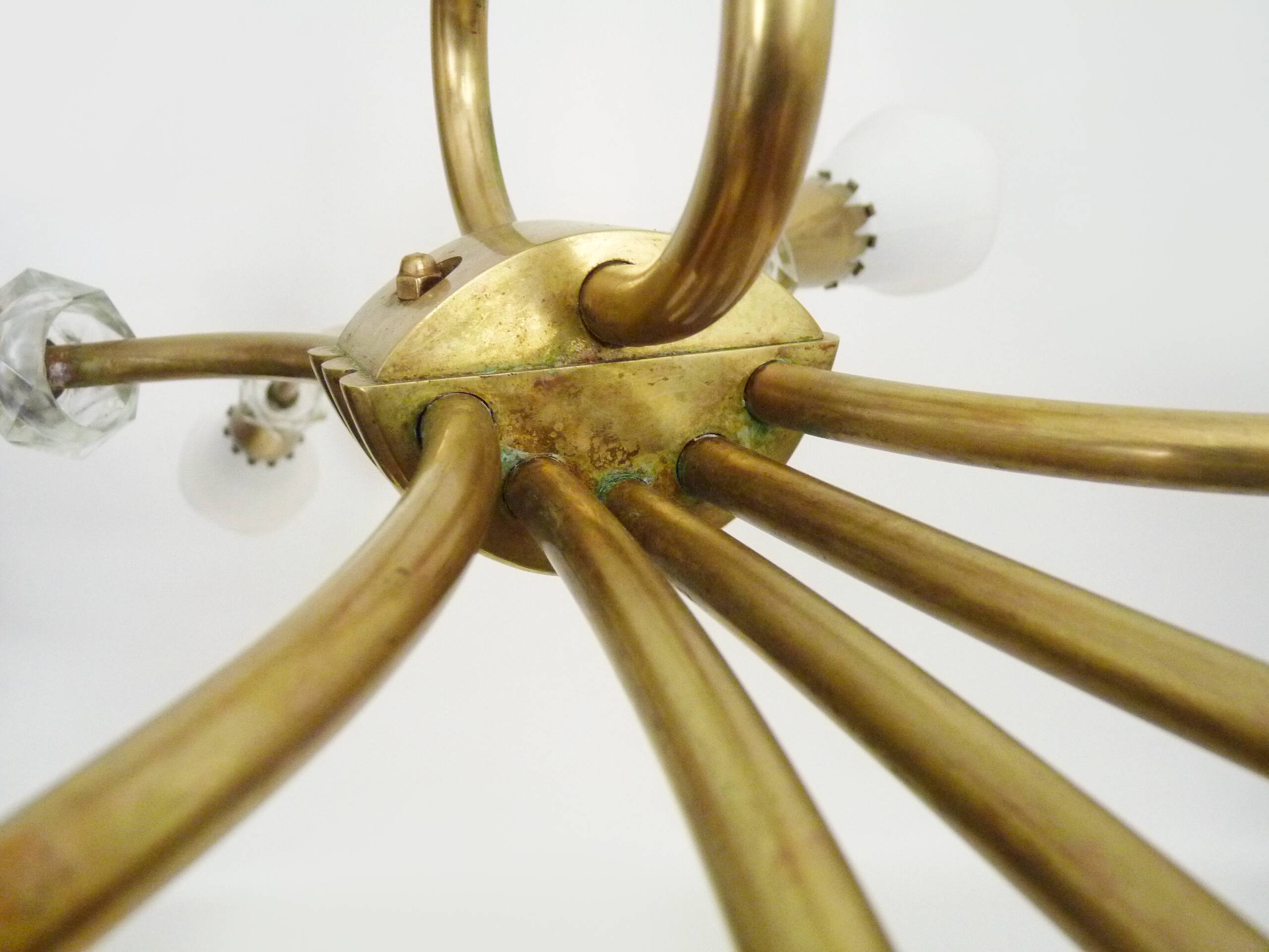Modernist chandelier with 10 brass branches and white glass tubes, 1970s
