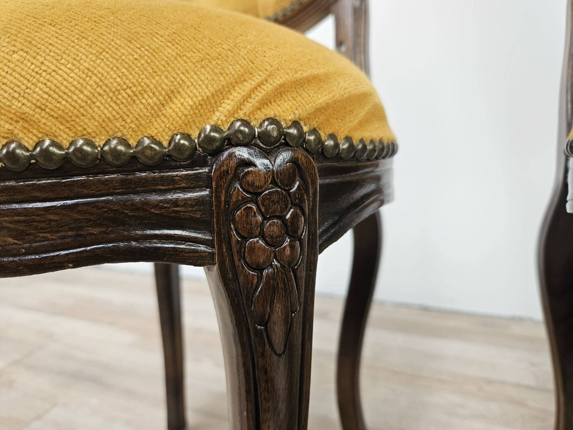 Pair of early 1900s wooden chairs with padded seat and backrests