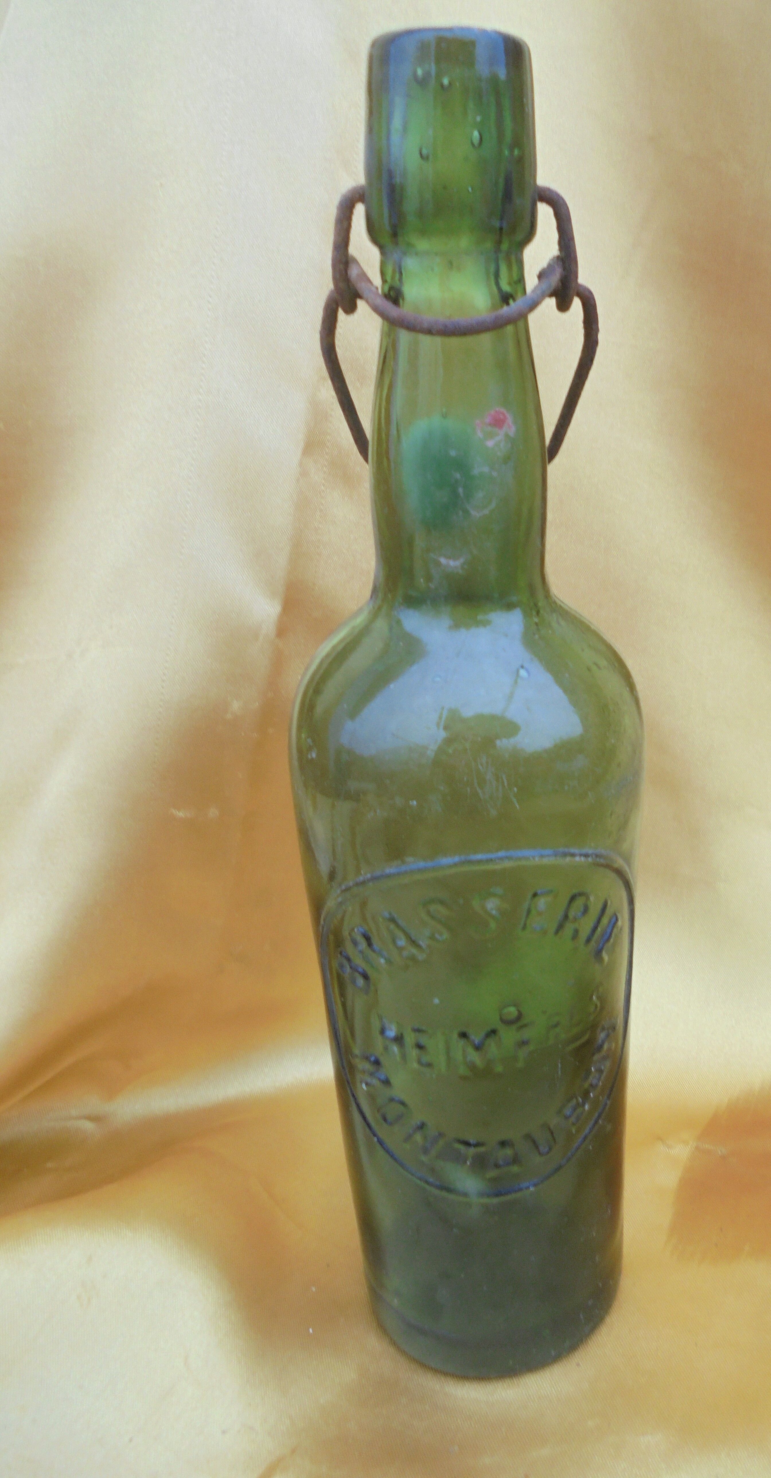 Old bottle of beer brewery HEIM Montauban green glass