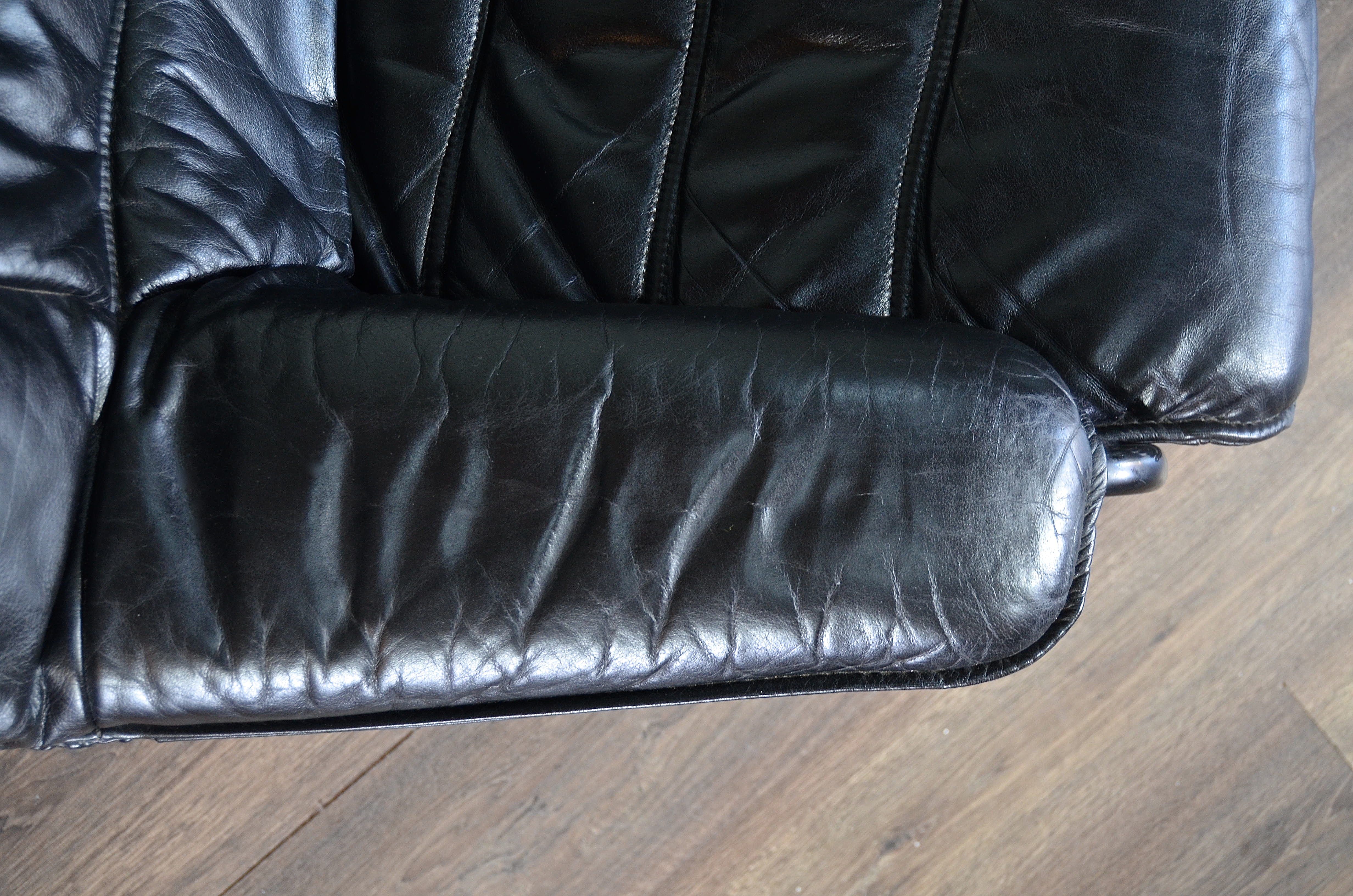 Norwegian Skoghaug industries vintage black leather swivel reclining chair