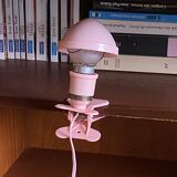 Small portable pink plastic mushroom clip-on lamp