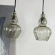 Pair of vintage glass pendant lights.