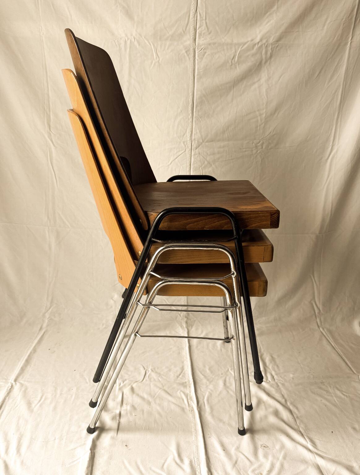 Stackable Manhattan chairs by Baumann