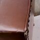 Club armchair in brown skai back mustache
