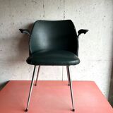 Vintage green faux leather and chrome armchair