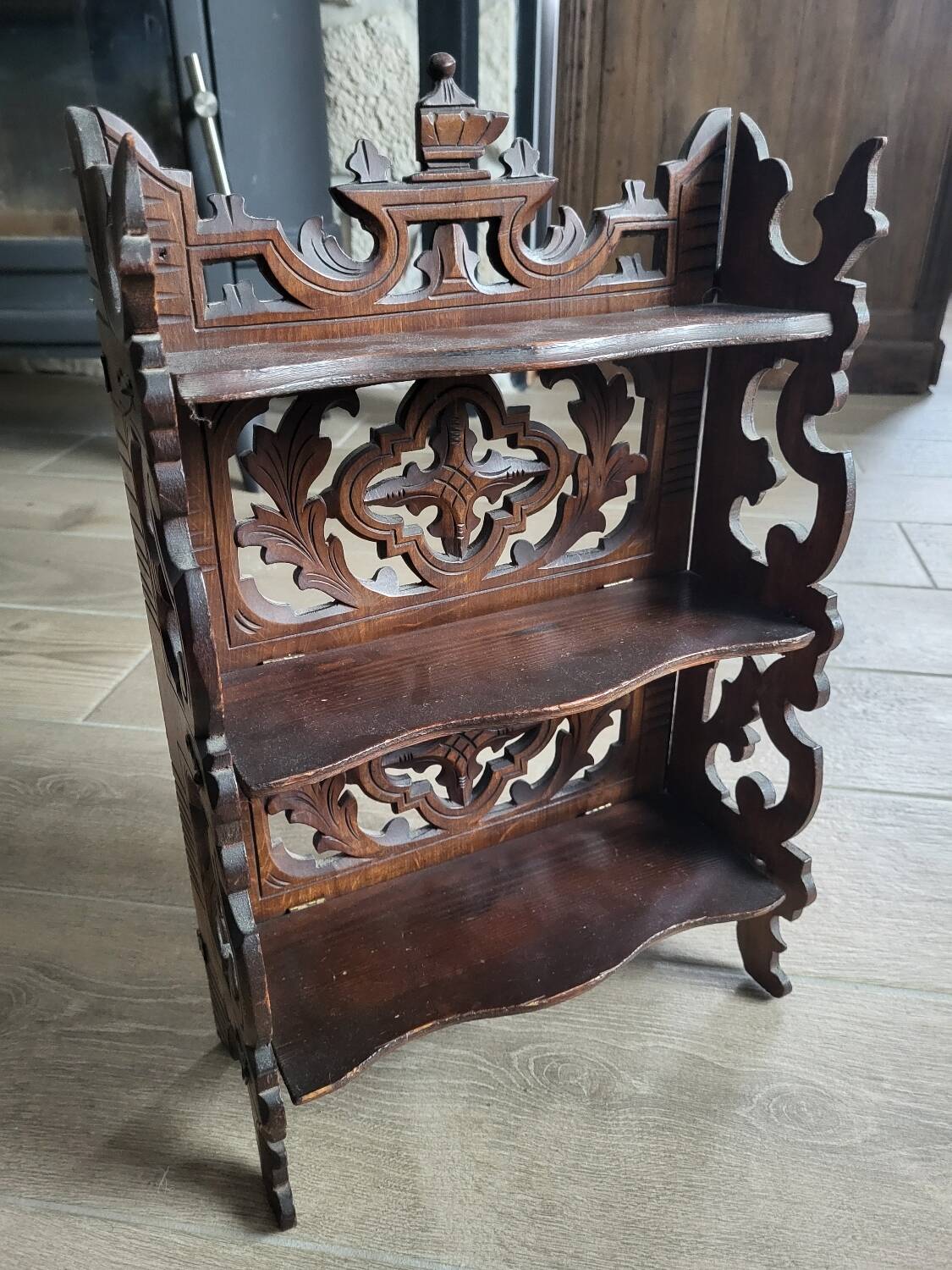Small carved wooden shelf