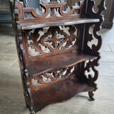 Small carved wooden shelf