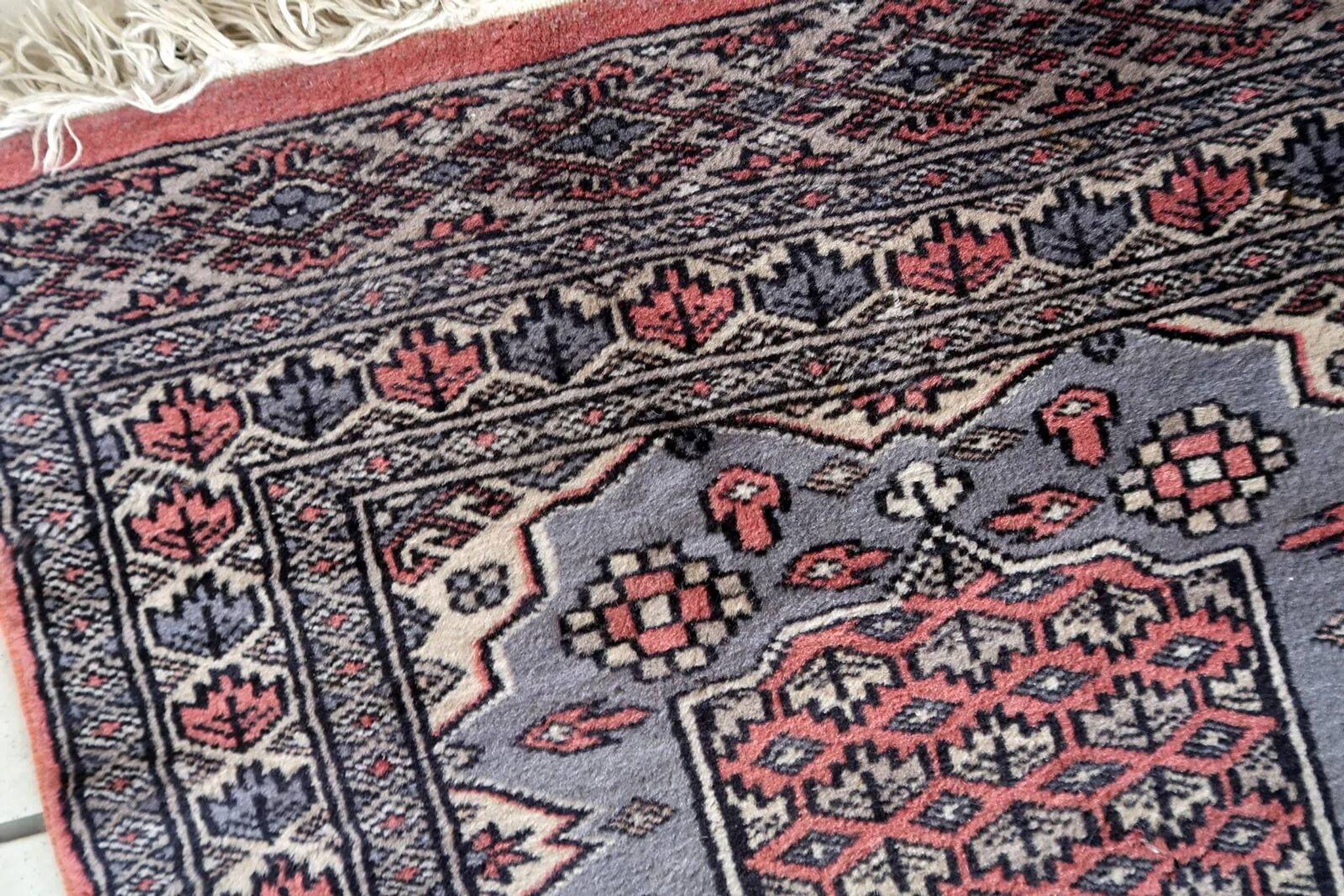 Handmade vintage Uzbek Bukhara rug 64cm x 94cm 1950s