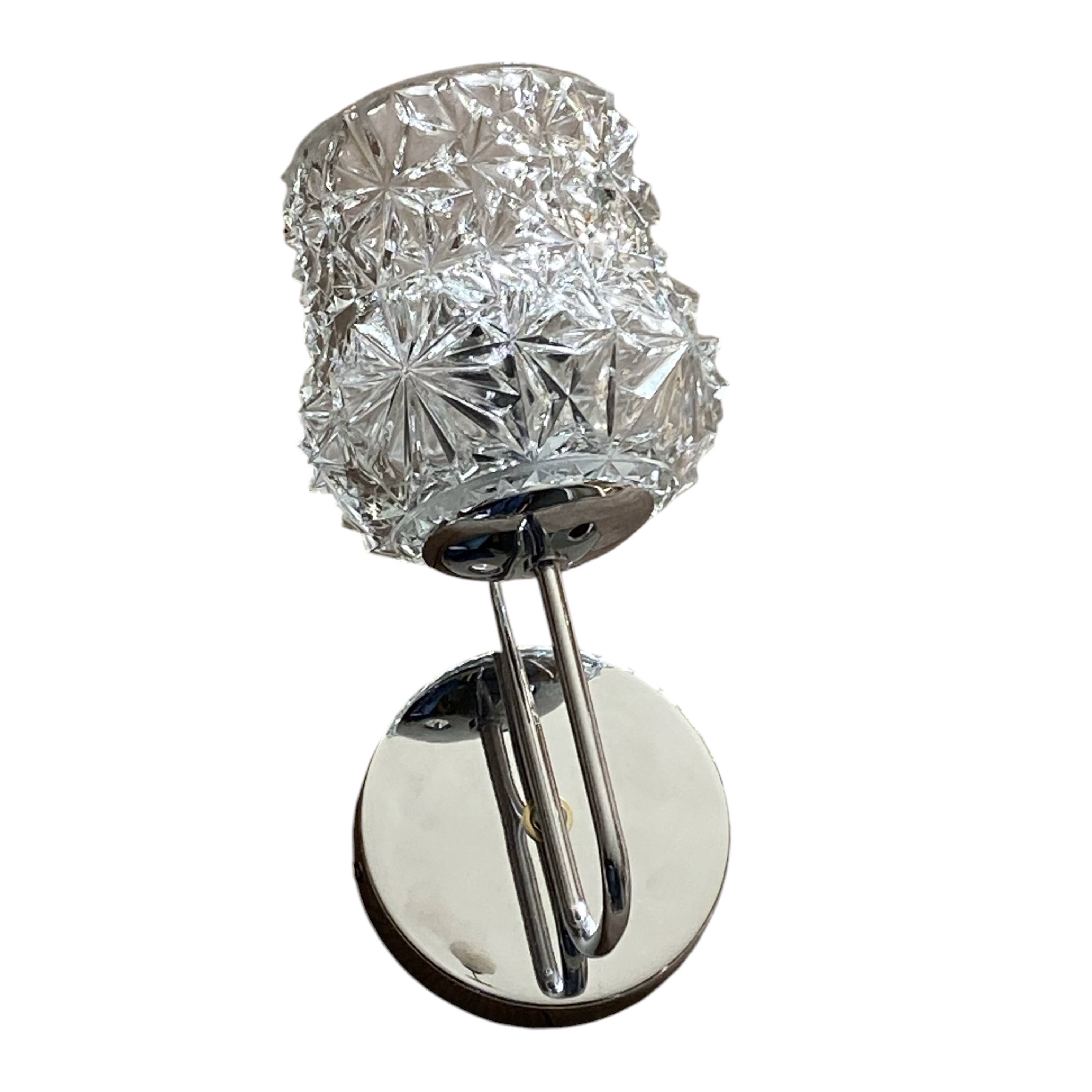 Swan neck wall light in stainless steel, thick glass shade, stainless steel rose.
