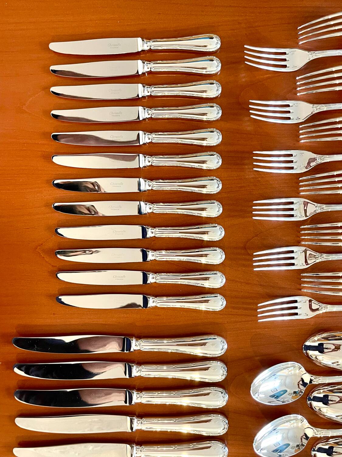 Christofle crossed ribbons, 73-piece cutlery set in new condition.