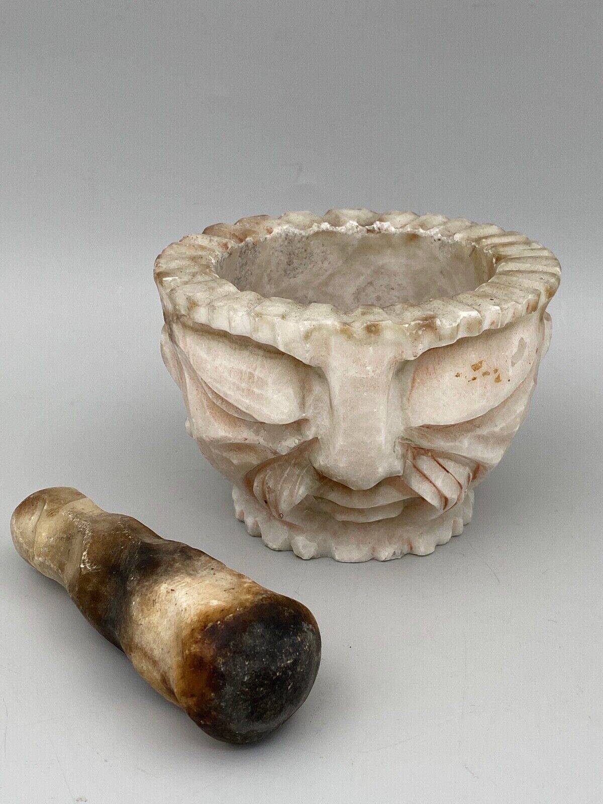 Pharmacy mortar and pestle in alabaster China man's face