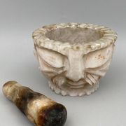 Pharmacy mortar and pestle in alabaster China man's face