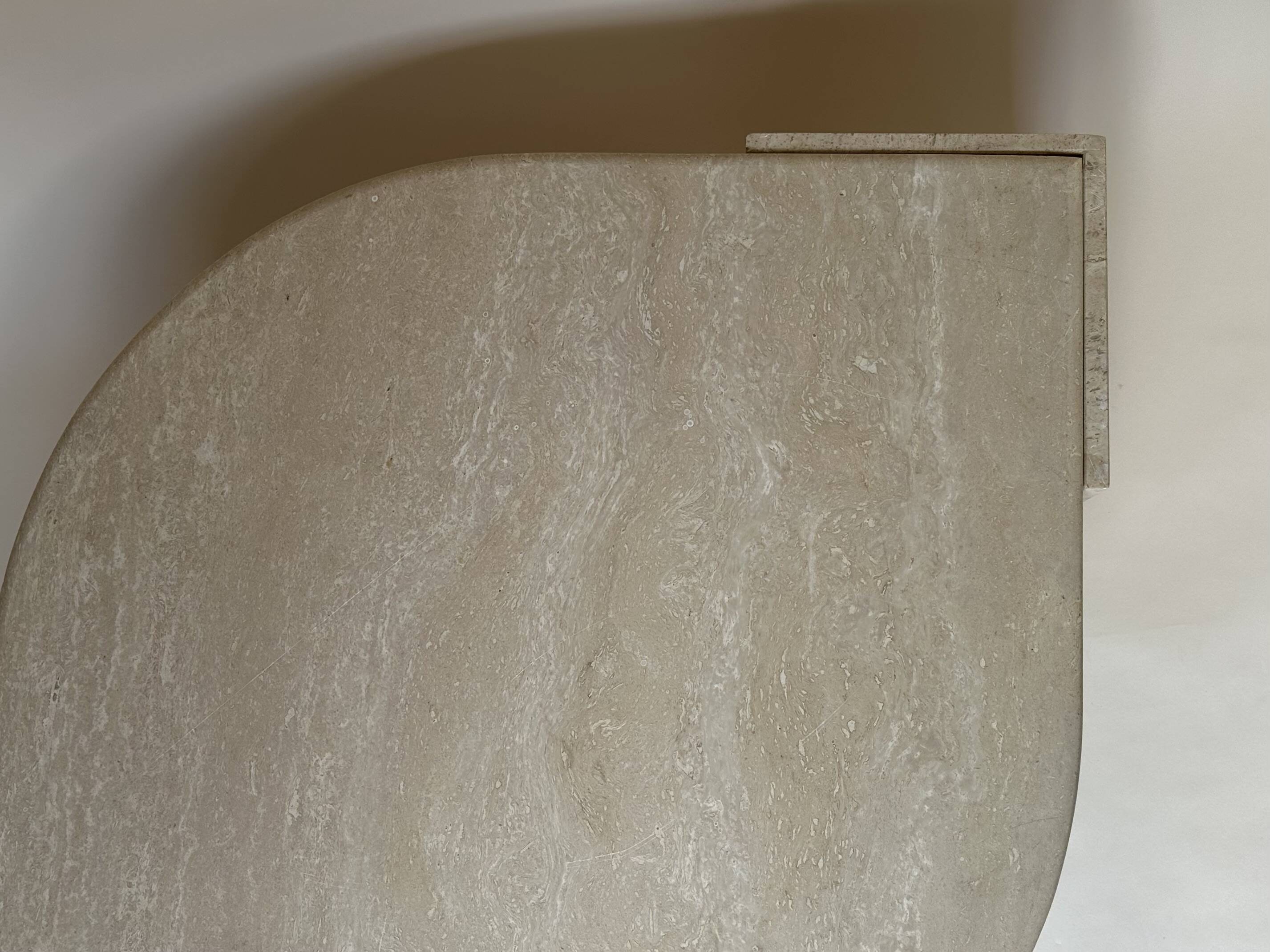 Travertine eye-shaped coffee table