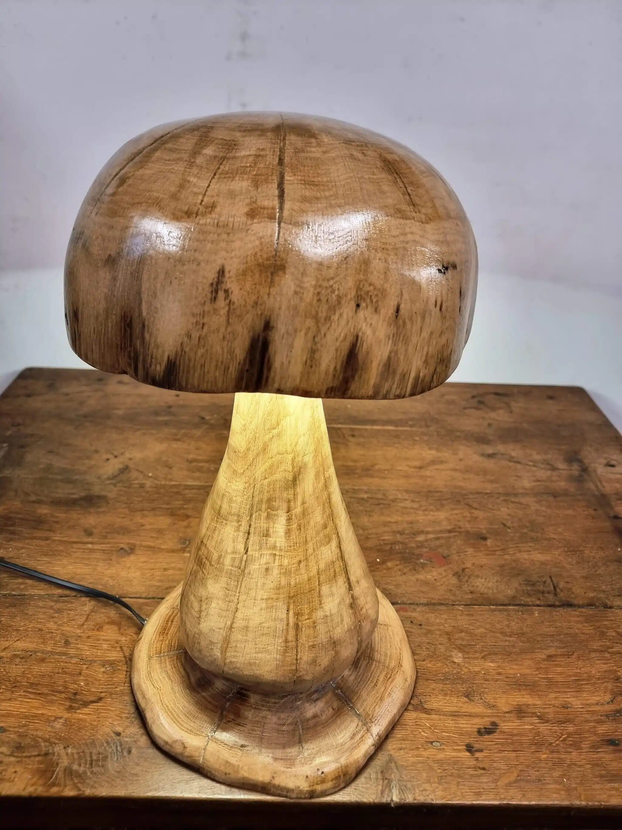 Hand-carved oak table lamp in the shape of a mushroom