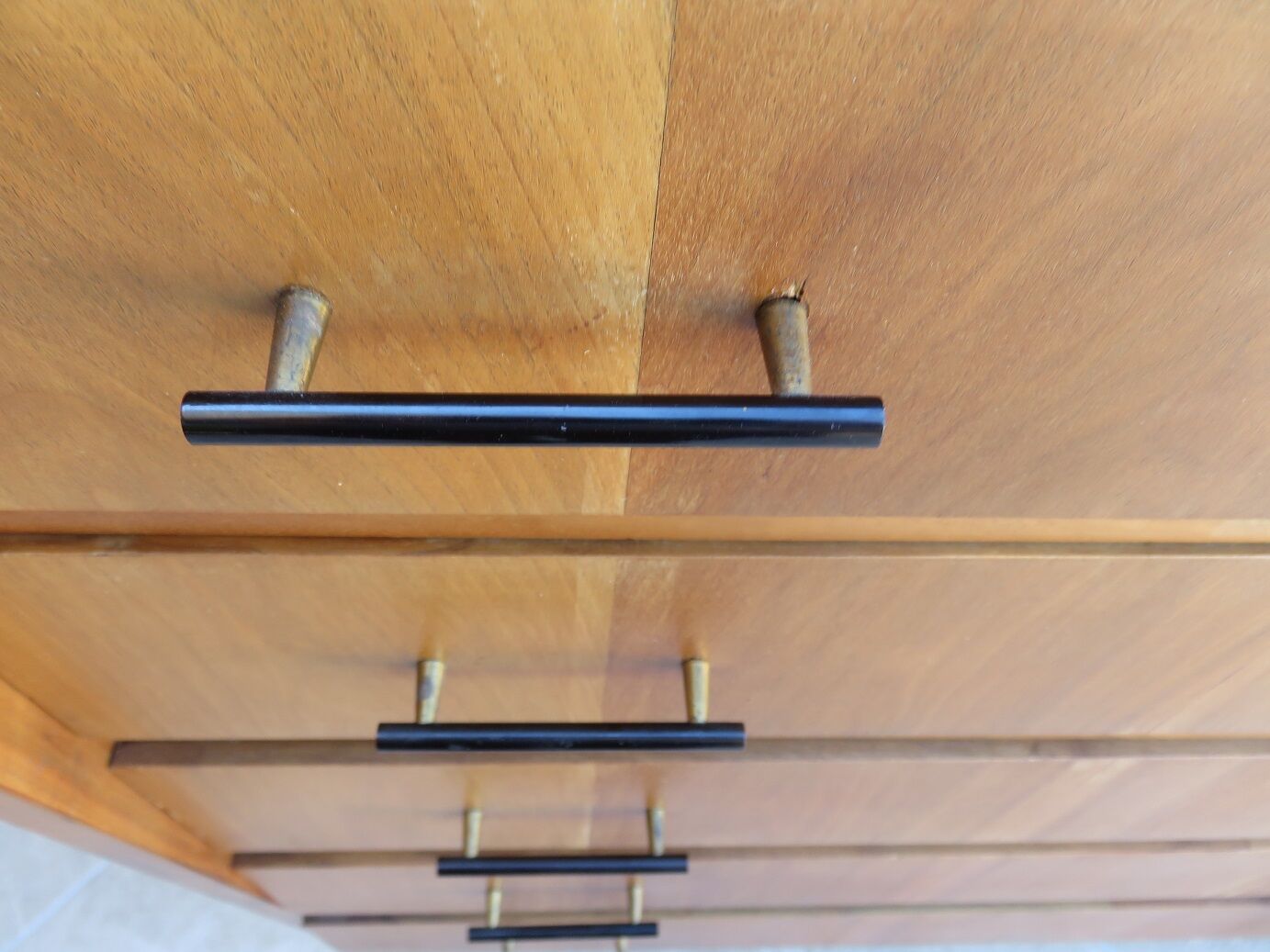 Teak chest of drawers and metal compass feet