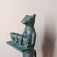 Antique metal cat candlestick