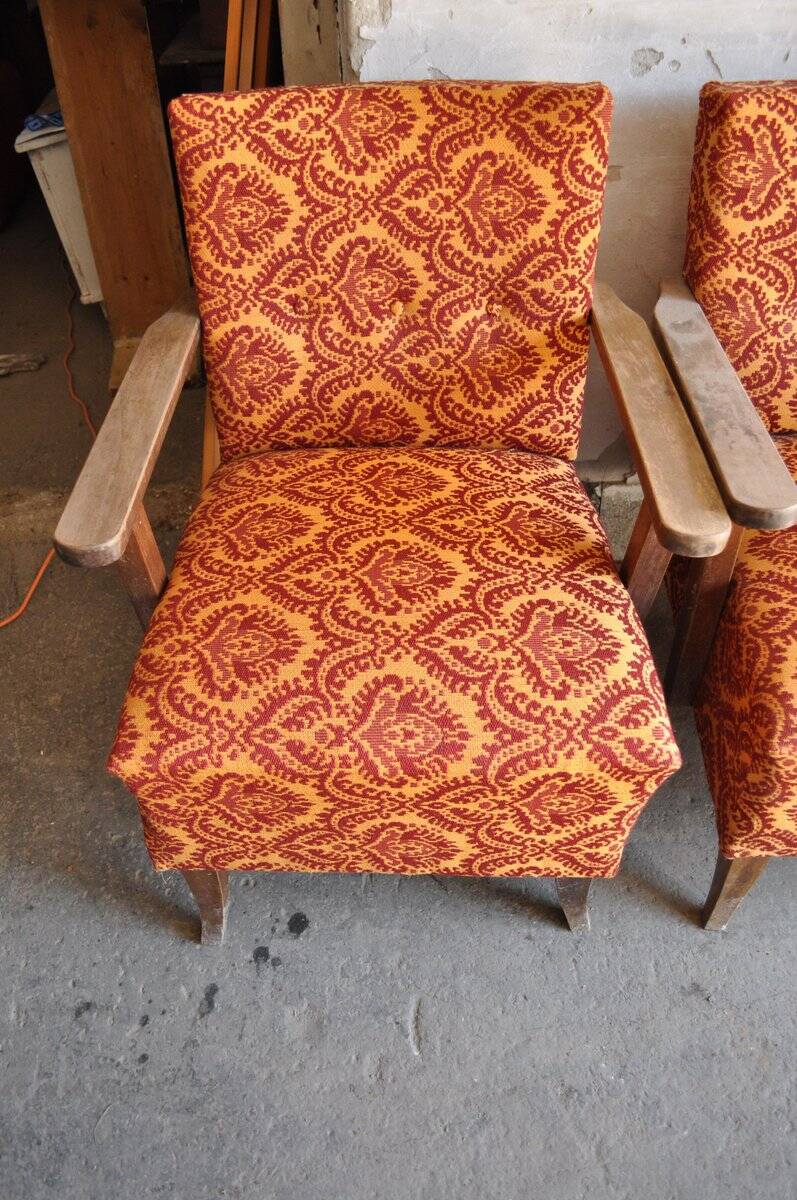 Set of 4 multicoloured mid-century armchairs in fabric and wood, 1950s.